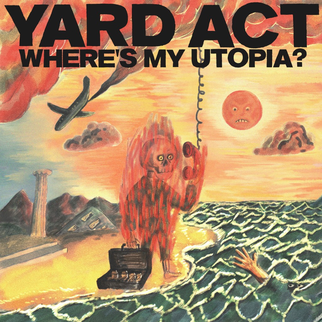 A man on a beach, on fire, holding a telephone, on the cover of Yard Act's Where's My Utopia